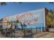Side view of a building with a large beach mural at 500 Deer Creek Rd. # D, Surfside Beach, SC 29575