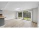 Living room with sliding glass doors to backyard at 500 Deer Creek Rd. # D, Surfside Beach, SC 29575