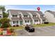 Townhouse complex with parking and landscaping at 500 Deer Creek Rd. # D, Surfside Beach, SC 29575