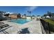 Community pool with a paved deck and surrounding fence at 512 9Th Ave. S, North Myrtle Beach, SC 29582