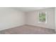 Bright bedroom with neutral walls and carpet at 831 Buttonwood Dr., Conway, SC 29527