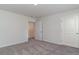 Bedroom with carpet, neutral walls and door to hallway at 831 Buttonwood Dr., Conway, SC 29527