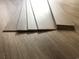Stacked planks of wood-look vinyl flooring at Tbb1 Shady Grove Rd., Conway, SC 29527