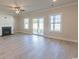 Bright living room featuring hardwood floors and fireplace at Tbb1 Shady Grove Rd., Conway, SC 29527