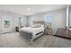 Main bedroom with plush carpeting and large window at 200 Delano Way, Myrtle Beach, SC 29588