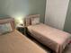 Second bedroom with two twin beds and closet at 616 River Oaks Dr. # 54F, Myrtle Beach, SC 29579
