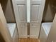 In-unit laundry area with full-size washer and dryer at 616 River Oaks Dr. # 54F, Myrtle Beach, SC 29579