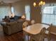 Open living and dining area with ample natural light at 616 River Oaks Dr. # 54F, Myrtle Beach, SC 29579