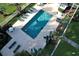 Community pool with several people enjoying a swim at 616 River Oaks Dr. # 54F, Myrtle Beach, SC 29579