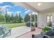 Screened porch with ceiling fan, access to backyard and grill at 794 Thistle Trail, Calabash, NC 28467