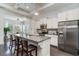 Well-equipped kitchen featuring an island, stainless steel appliances, and ample counter space at 794 Thistle Trail, Calabash, NC 28467