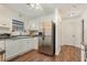 Kitchen with stainless steel appliances and hardwood floors at 1356 Tranquility Ln., Myrtle Beach, SC 29577
