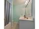 Clean bathroom with double vanity, shower/tub combo, and light-blue walls at 1356 Tranquility Ln., Myrtle Beach, SC 29577