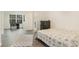 Bright bedroom with a double bed, dresser, and access to the bathroom at 1356 Tranquility Ln., Myrtle Beach, SC 29577