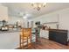Well-equipped kitchen with island seating and dark cabinetry at 1356 Tranquility Ln., Myrtle Beach, SC 29577