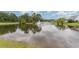 Serene pond view with lush landscaping at 500 Willow Greens Dr. # B, Conway, SC 29526