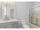 Clean bathroom with gray vanity, shower, and toilet at 500 Willow Greens Dr. # B, Conway, SC 29526