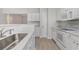 Kitchen with white cabinets, stainless steel sink, and appliances at 500 Willow Greens Dr. # B, Conway, SC 29526