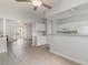 Open kitchen with white cabinets and breakfast bar at 500 Willow Greens Dr. # B, Conway, SC 29526