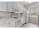 White kitchen with appliances and ample counter space at 500 Willow Greens Dr. # B, Conway, SC 29526
