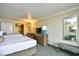 Two beds, dresser, and a small bench at 1105 S Ocean Blvd. # 1044, Myrtle Beach, SC 29577