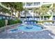 Circular hot tub surrounded by lounge chairs at 1105 S Ocean Blvd. # 1044, Myrtle Beach, SC 29577