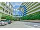 Exterior view of Coral Beach Resort with parking lot at 1105 S Ocean Blvd. # 1044, Myrtle Beach, SC 29577