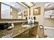 Bathroom features granite countertop and ample storage at 1105 S Ocean Blvd. # 1044, Myrtle Beach, SC 29577
