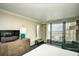 Bedroom with ocean view and balcony access at 1105 S Ocean Blvd. # 1044, Myrtle Beach, SC 29577