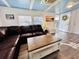 Spacious living room with a large leather sectional and a coffee table at 6001 - N21 S Kings Hwy., Myrtle Beach, SC 29575