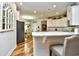 Modern kitchen with granite countertops and white cabinets at 437 Oaklanding Ln., Murrells Inlet, SC 29576