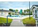 Community pool with lounge chairs and nearby library at 437 Oaklanding Ln., Murrells Inlet, SC 29576