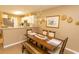 Dining area with wood table and bench seating at 4448 Lady Banks Ln. # 11 B, Murrells Inlet, SC 29576