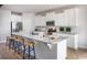 Modern kitchen with stainless steel appliances and a large island at 6060 Zoe Way, Myrtle Beach, SC 29588