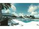 Community pool with lounge chairs and umbrellas at 6060 Zoe Way, Myrtle Beach, SC 29588