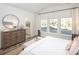 Spacious main bedroom with a dresser and ensuite bathroom at 6088 Zoe Way, Myrtle Beach, SC 29588