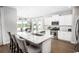 Spacious kitchen with white cabinets, granite countertops, and stainless steel appliances at 5042 Selene Ct., Myrtle Beach, SC 29588