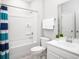 Full bathroom with tub/shower combo and a stylish blue and white shower curtain at 5042 Selene Ct., Myrtle Beach, SC 29588