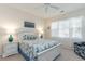 Bright bedroom with a queen-size bed, and two nightstands at 601 Hillside Dr. N # 3906, North Myrtle Beach, SC 29582