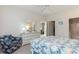 Bedroom with dresser, ensuite bathroom access, and a queen-size bed at 601 Hillside Dr. N # 3906, North Myrtle Beach, SC 29582