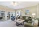 Living Room with sectional sofa, access to patio and water view at 601 Hillside Dr. N # 3906, North Myrtle Beach, SC 29582
