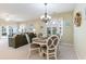 Charming dining area with a round table and four chairs at 601 Hillside Dr. N # 3906, North Myrtle Beach, SC 29582