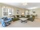 Spacious living room with sectional sofa and a large window at 601 Hillside Dr. N # 3906, North Myrtle Beach, SC 29582