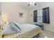 Bedroom with queen bed, nightstand, and window with curtains at 601 Hillside Dr. N # 3906, North Myrtle Beach, SC 29582