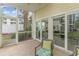 Relaxing screened porch with patio furniture and views of the backyard at 601 Hillside Dr. N # 3906, North Myrtle Beach, SC 29582