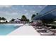 Relaxing pool area with lounge chairs and shade structure at 5050 Selene Ct., Myrtle Beach, SC 29588