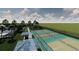 Aerial view of community amenities including tennis and pickleball courts, playground, and pool at 5050 Selene Ct., Myrtle Beach, SC 29588