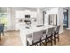 L-shaped kitchen island with granite countertops and stainless steel appliances at 5050 Selene Ct., Myrtle Beach, SC 29588