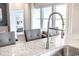 Close-up of a modern kitchen faucet with a high-arc design at 5050 Selene Ct., Myrtle Beach, SC 29588