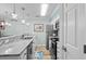 Stainless steel appliances and granite countertops in a well-lit kitchen at 4274 Pinehurst Circle # V5, Little River, SC 29566